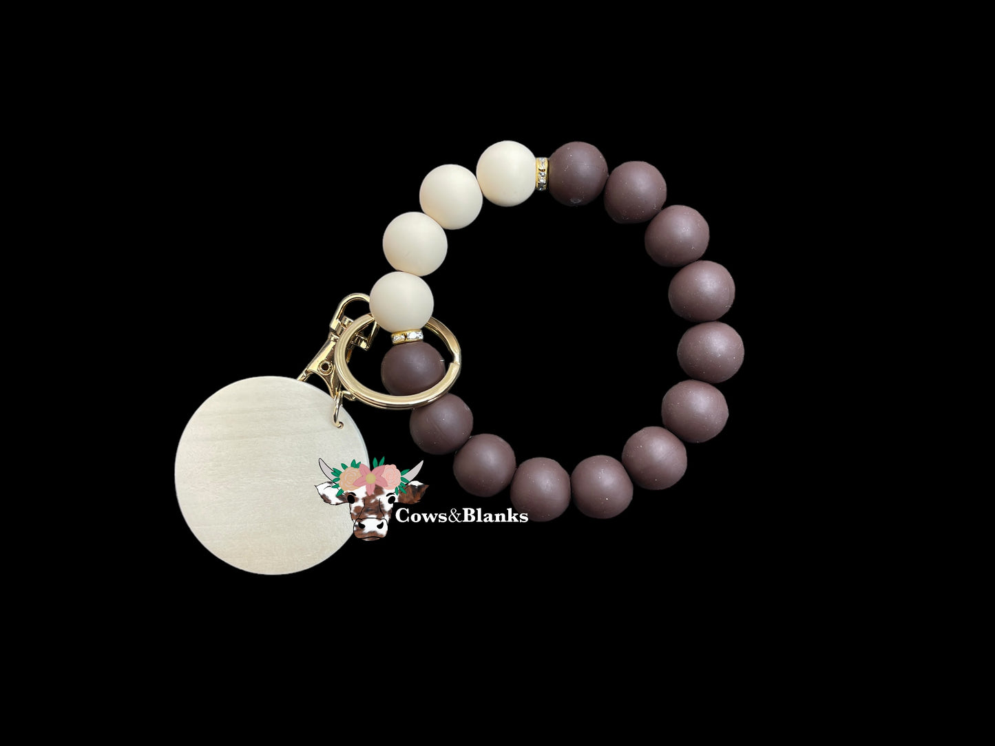 COFFEE AND CREAM COLORED SILICONE WRISTLET  BRACELET WITH WOOEEN DISC AND TASSEL