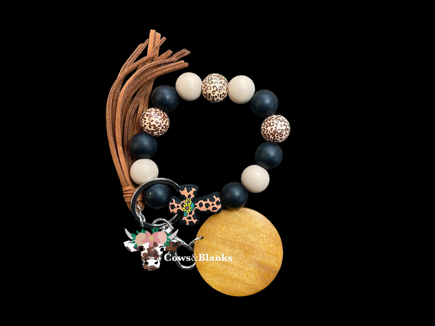 Easter: Laying My Cross Down Wristlet With a Silicone Cross , Black and Tan Silicone Beads and Accent Leopard Print Wooden Beads with a Matching Tassel and Engravable Wooden Disc