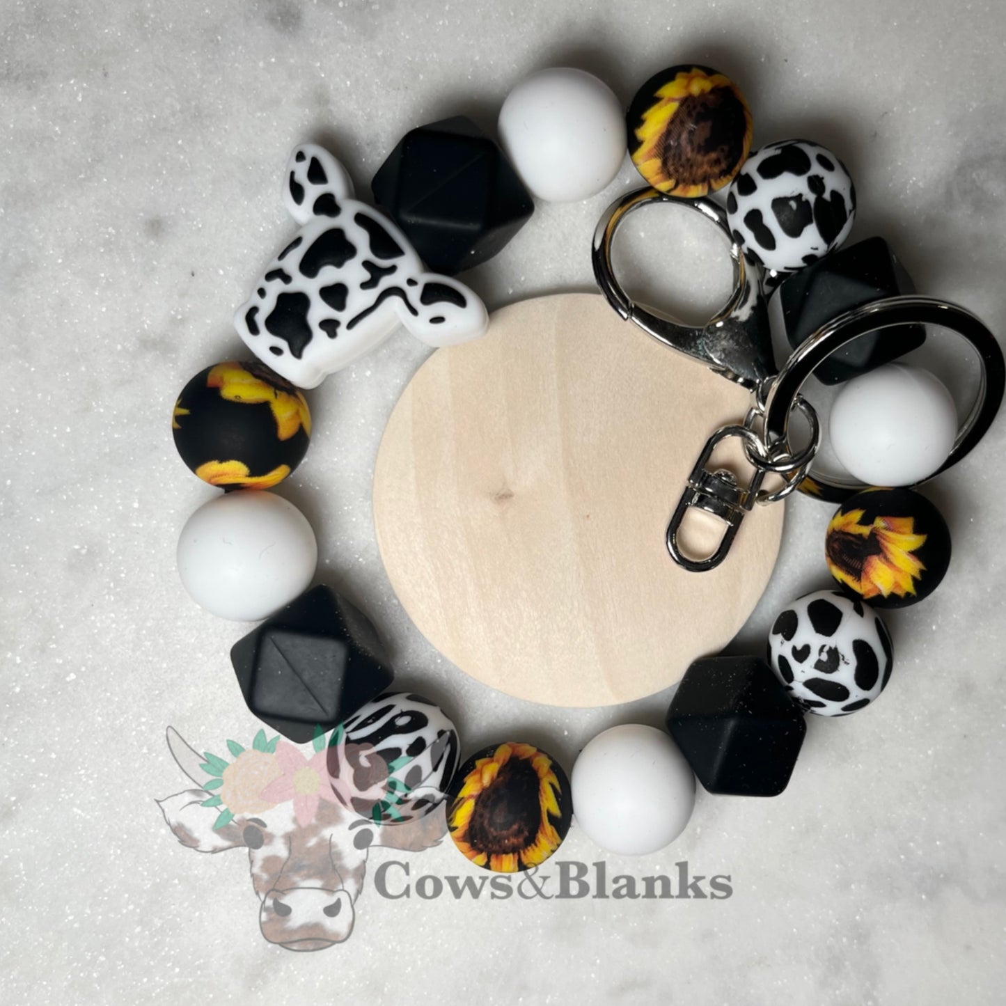 COW HEAD WITH SUNFLOWER SILICONE BEAD AND SOLID WHITE AND BLACK ACCENT BEADED STRETCHY WRISTLET WITH WOOD DISC