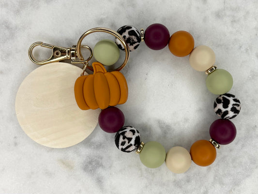 AUTUMN PUMPKIN SILICONE PENDENT STRETCH WRISTLET BRACELET KEYCHAIN WITH WOODEN DISC