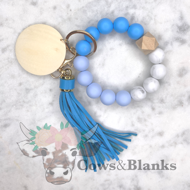 Marbled Pastels and Grays Stretch Silicone Wristlet Bracelet Keychain with Wooden Disc and Tassel