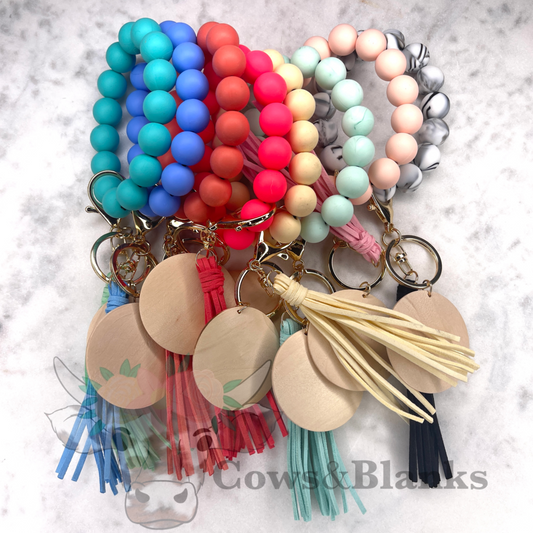 Solid Colored Silicone Wristlet Bracelet Keychain with Wooden Disc and Tassel