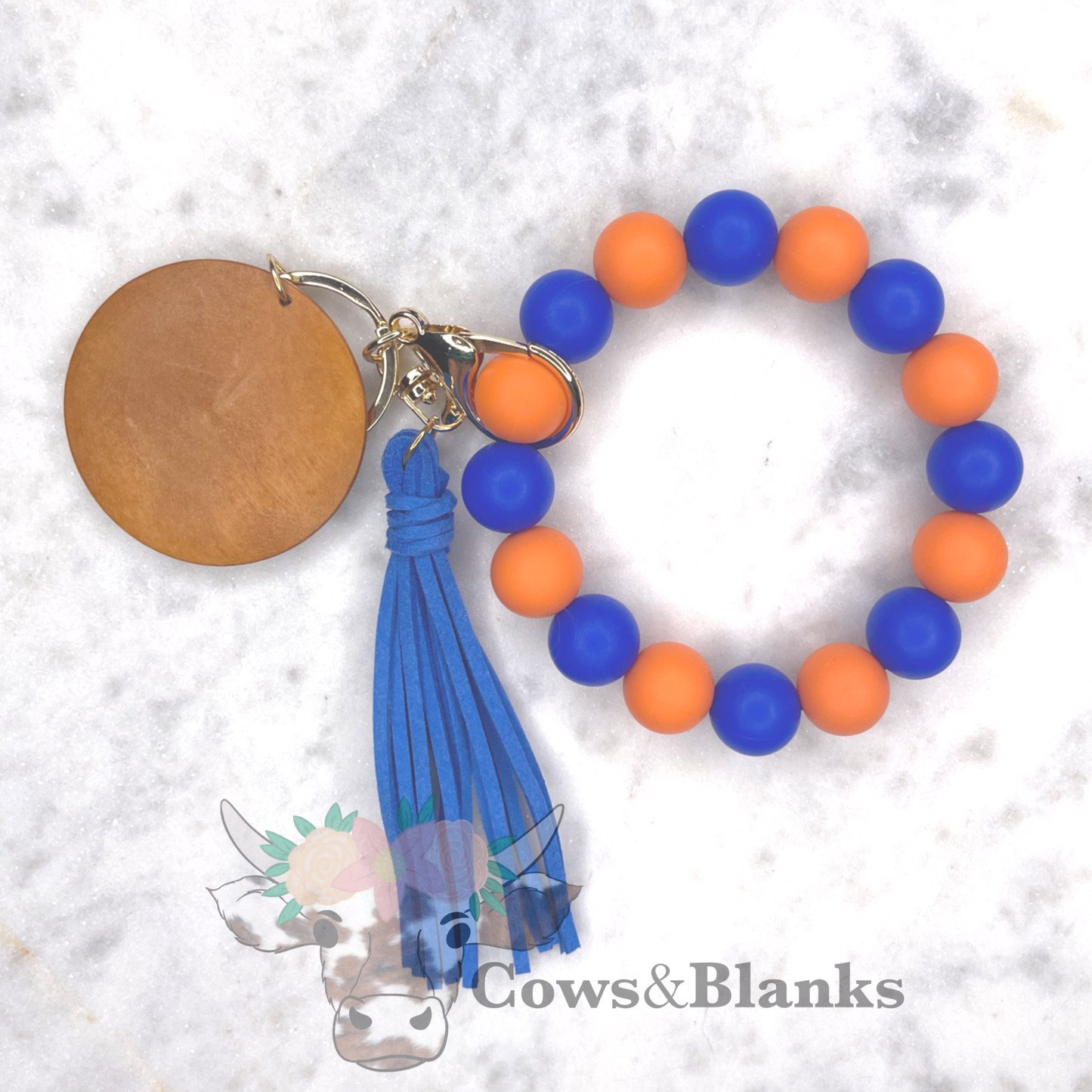 It takes two. Blue and Orange Silicone Wristlet Bracelet Keychain with Wooden Disc and Tassel