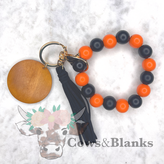 Navy and Orange Wooden Wristlet Bracelet Keychain with Wooden Disc and Tassel