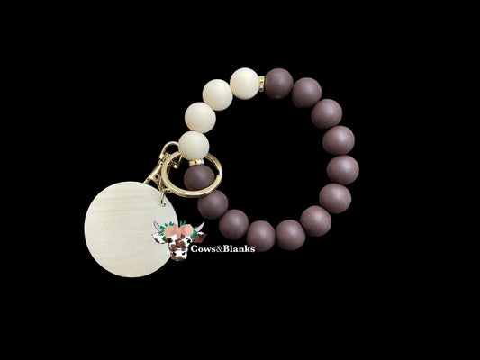 Coffee and Cream Colored Silicone Stretch Wristlet Bracelet Keychain with Wooden Disc and Tassel