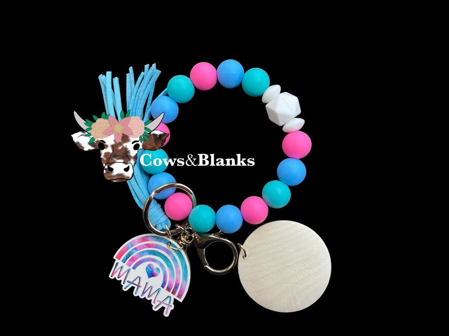 Mama! Bright Pink, Green and Blue Silicone Stretch Beaded Wristlet Bracelet Keychain with a Wooden Tie-Dye Rainbow Mama Charm Accented with White Silicone Beads, Gold Hardware, a Matching Tassel,  and a Wooden Disc