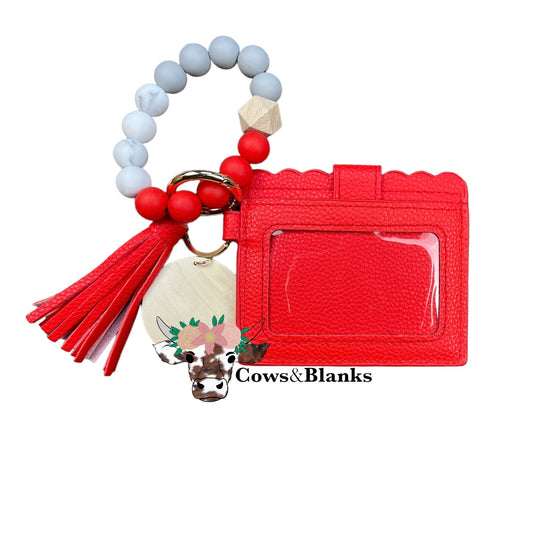Wallet/Wristlet with Solid Red Cardholder with a White Marble, Red, and Gray Silicone Beaded Wristlet with a Wooden Accent Bead, Gold Hardware, Matching Tassel, and a Wooden Disc
