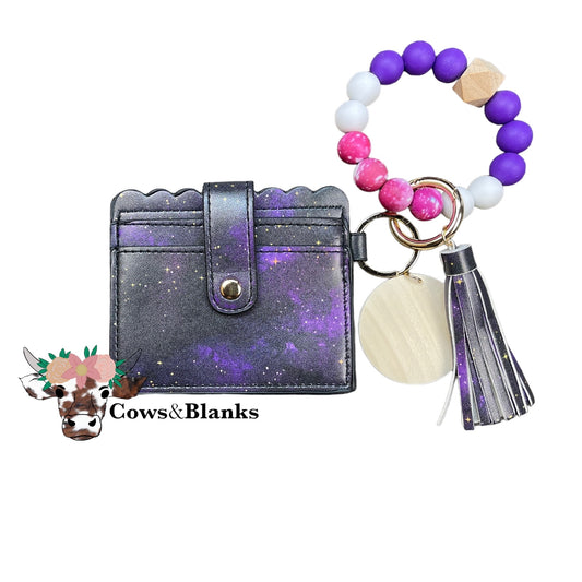 Wallet/Wristlet with Dark Purple Galaxy Cardholder with a White, Purple, and White/Dark Pink Silicone Beaded Wristlet with a Wooden Accent Bead, Gold Hardware, Matching Tassel, and a Wooden Disc