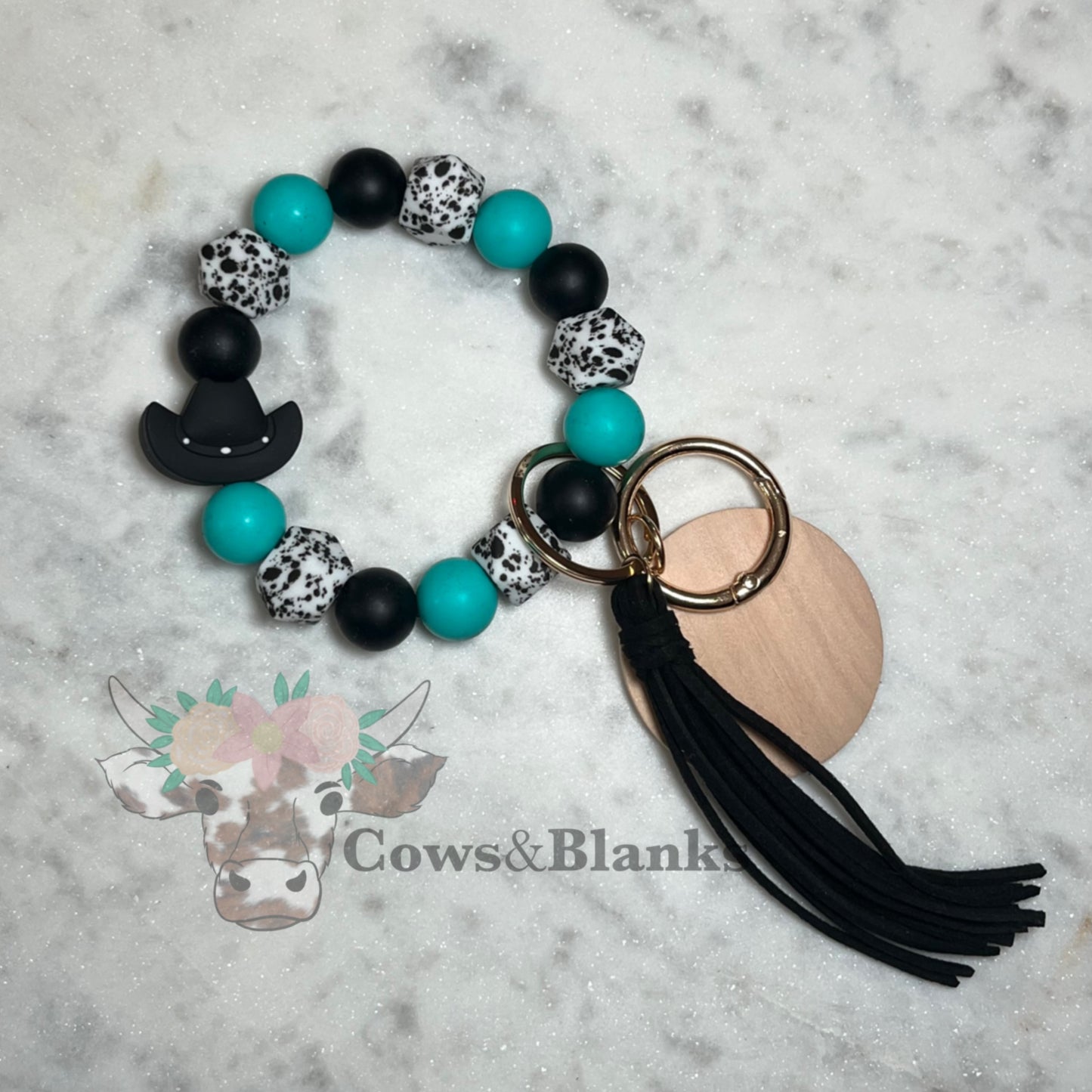 Cowgirl or Cowboy Black Hat Silicone Bead with Teal, Black, and Cow Print Beaded Stretch Wristlet Bracelet Keychain with Wooden Disc and Tassel