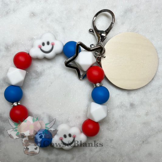 Happy Clouds Patriotic Silicone Beaded Stretch Wristlet Bracelet  Keychain with Wooden Disc and Tassel