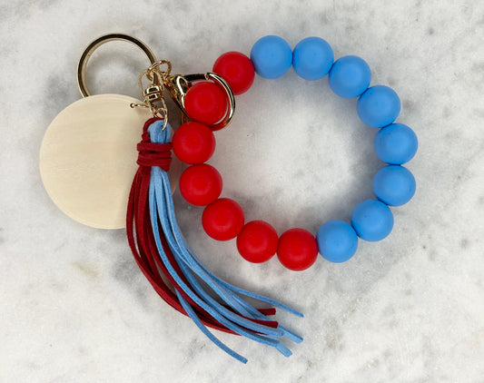 Yin and Yang Red and Blue Silicone Stretch Wristlet Bracelet Keychain with Wooden Disc and Tassel