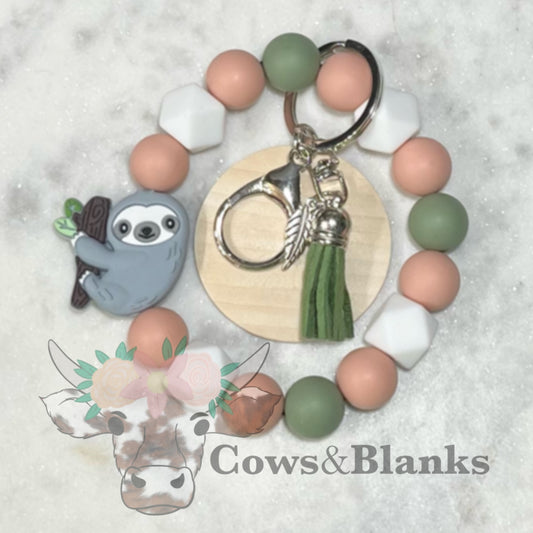 Sloth Silicone Beaded Stretch Wristlet Bracelet Keychain with Wooden Disc and Tassel